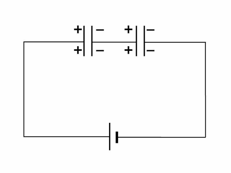 Circuit consisting of a voltage source and two capacitors in series