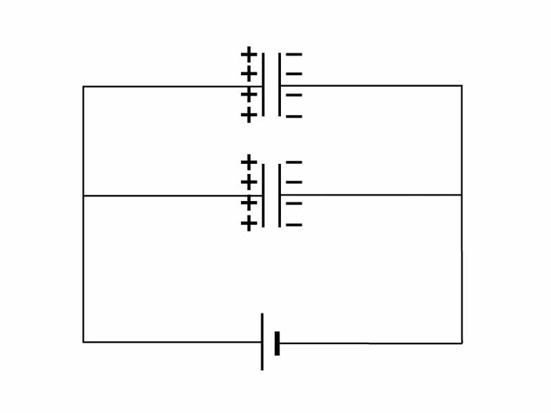 Circuit consisting of a voltage source and two capacitors in parallel