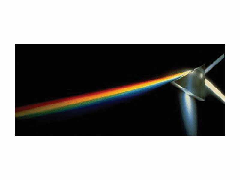White light dispersed by a prism into the colors of the optical spectrum.