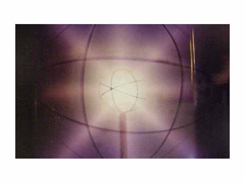 Farnsworth–Hirsch Fusor during operation in so called star mode characterized by rays of glowing plasma which appear to emanate from the gaps in the inner grid.