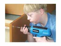 Boy with Down syndrome assembling a b...